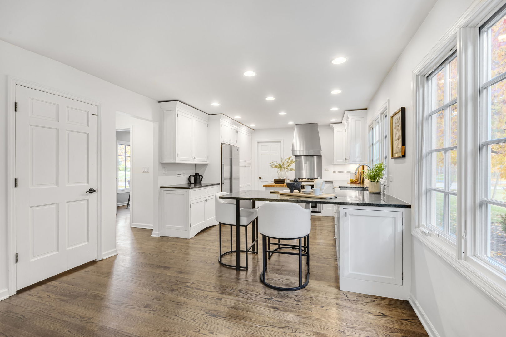 540 Buena Road Lake Forest, IL 60045 - Photo 9 of 35 a kitchen with a sink and wooden cabinets