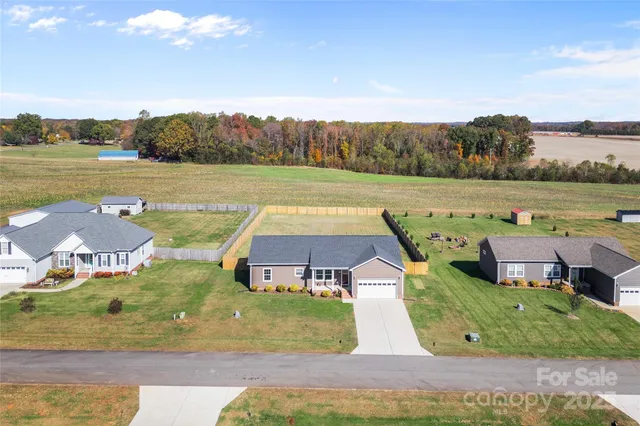 a view of a lake with couches and city view