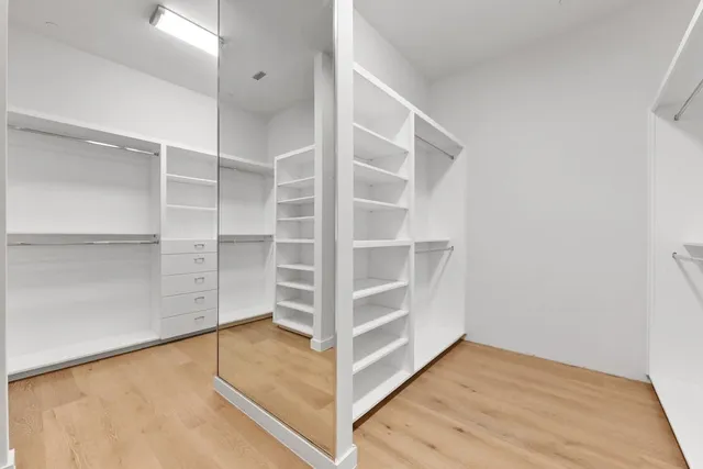 a view of an empty room with empty racks