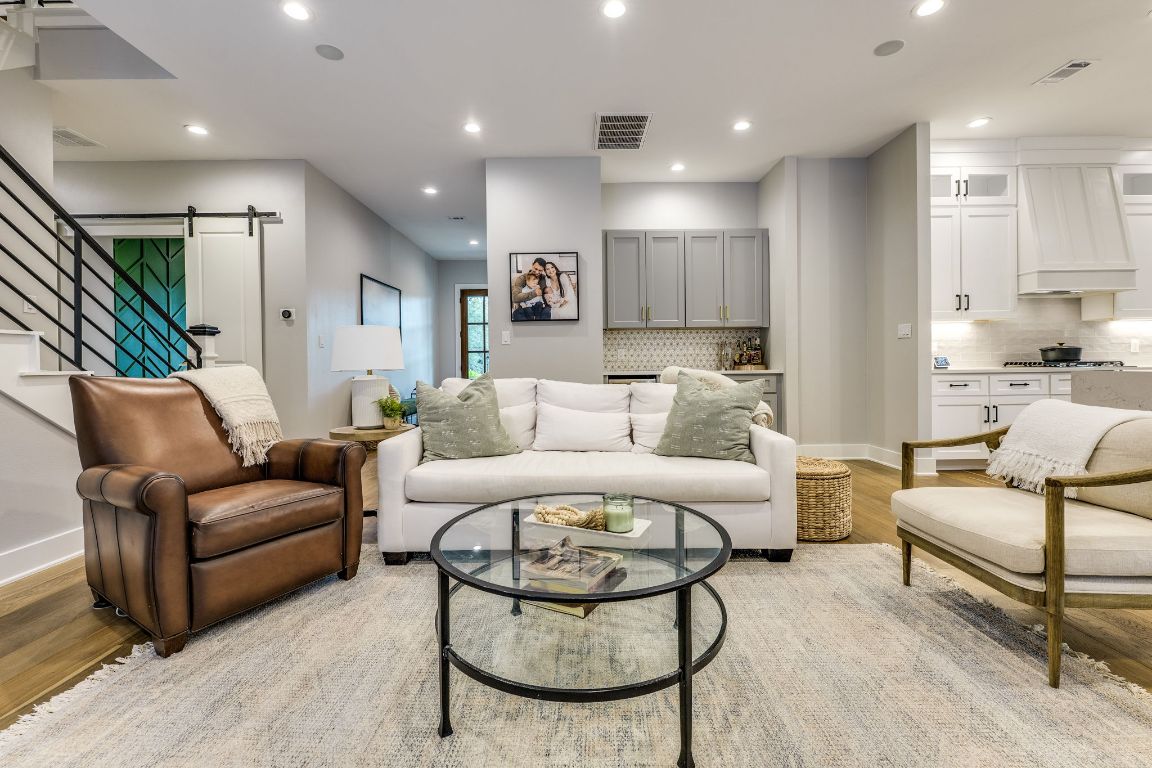 5904 Hudson Bend Road Austin, TX 78734 - Photo 16 of 37 The living room also features a dry bar with a built-in mini fridge—perfect for entertaining.