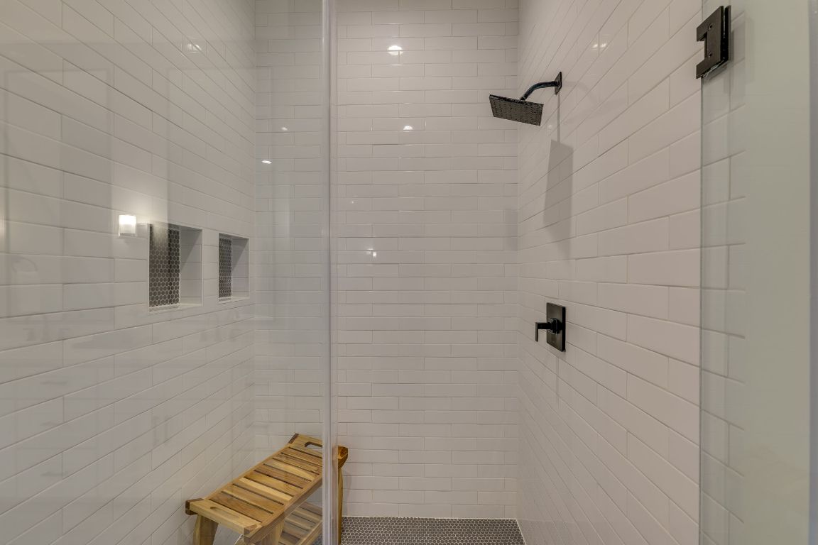 5904 Hudson Bend Road Austin, TX 78734 - Photo 23 of 37 It also features an oversized walk in shower and access to the massive closet, complete with washer and dryer.