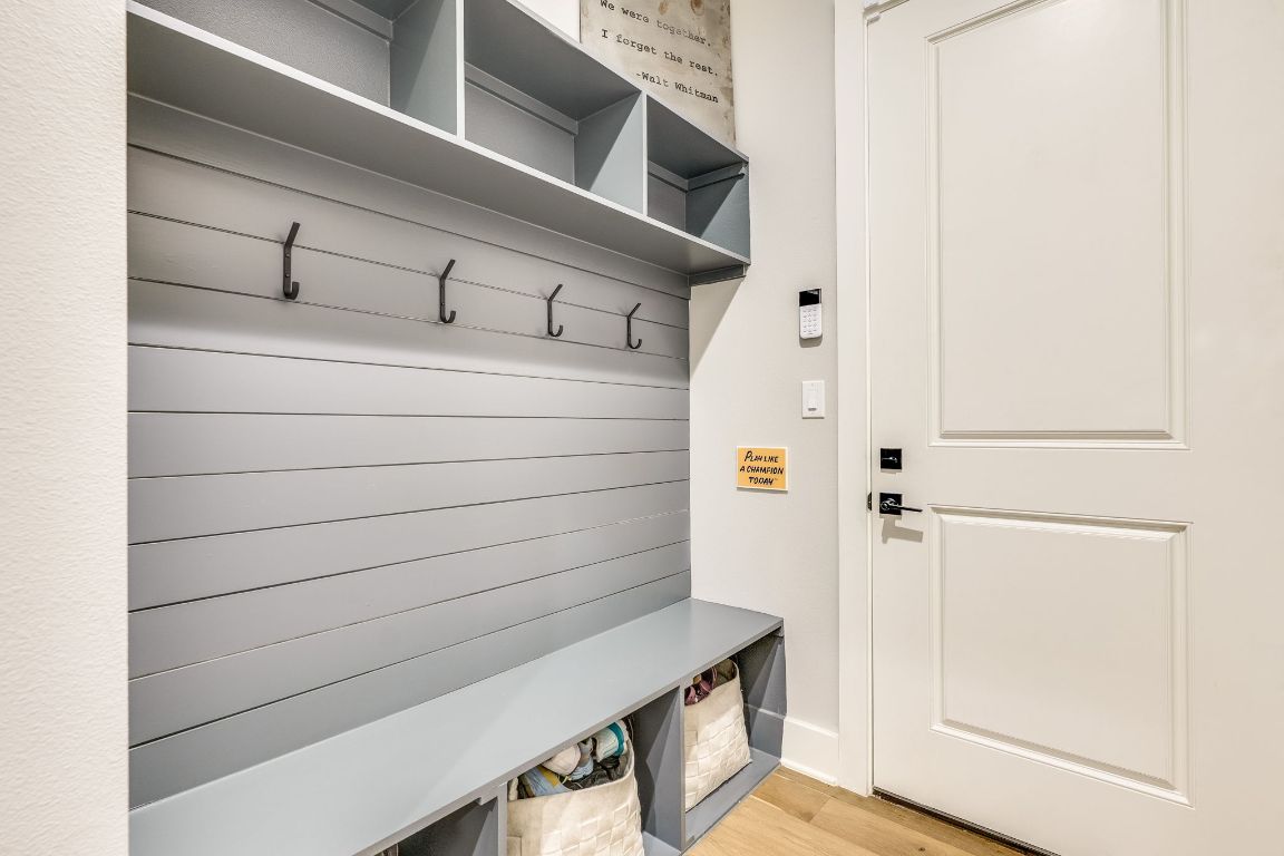 5904 Hudson Bend Road Austin, TX 78734 - Photo 24 of 37 The mudroom includes a built-in mud bench, ideal for storing dirty shoes, jackets, and backpacks.