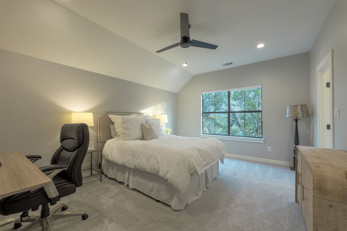 5904 Hudson Bend Road Austin, TX 78734 - Photo 27 of 37 This room on the second level features its own ensuite, making it perfect for overnight guests.