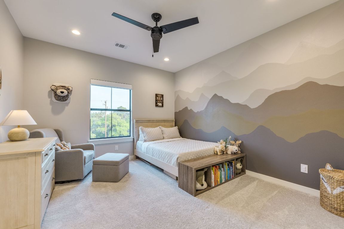 5904 Hudson Bend Road Austin, TX 78734 - Photo 30 of 37 Two of the secondary rooms are bathed in natural light and share an adjoining bathroom.