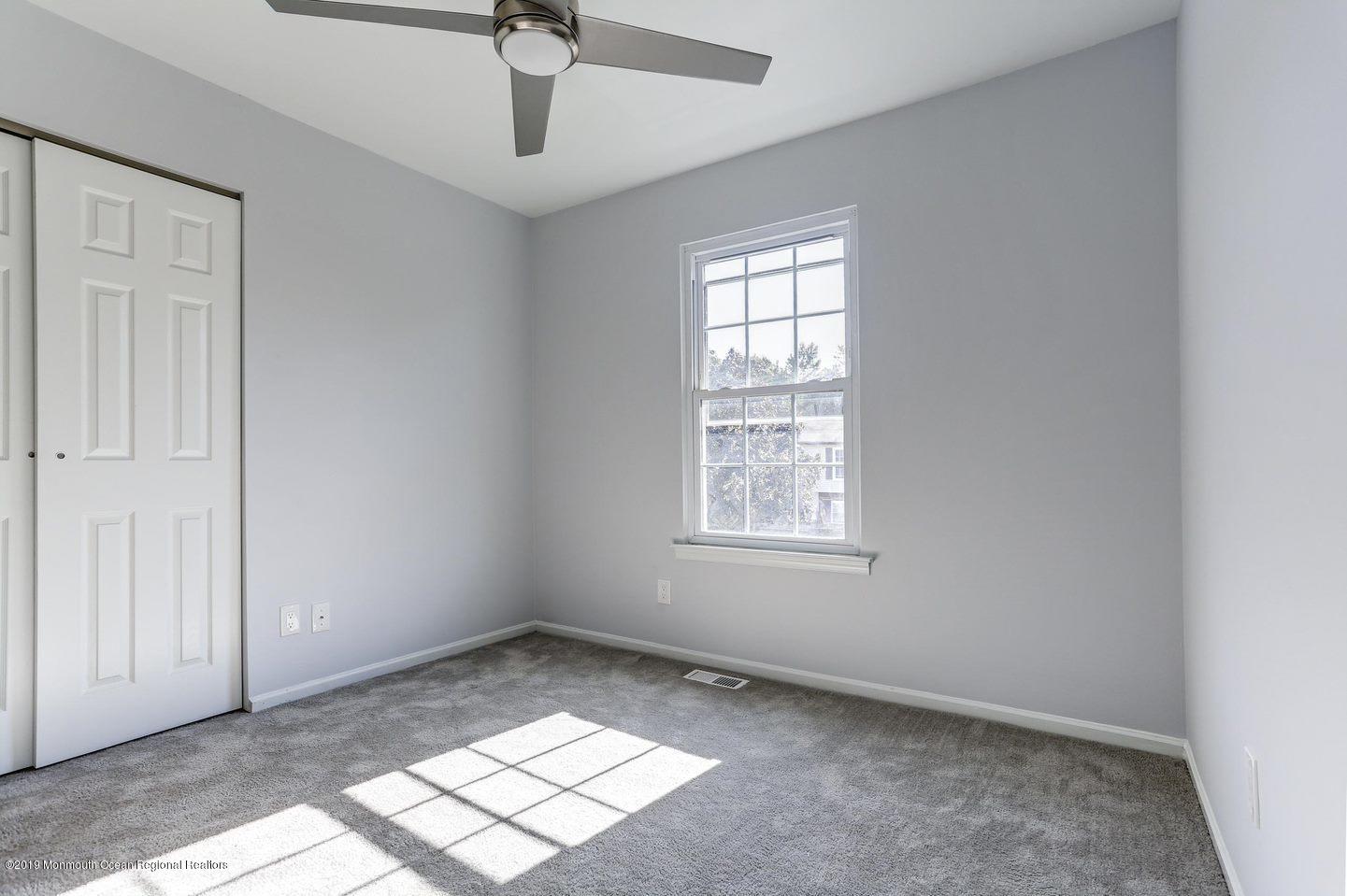 32 Hedgewood Road Howell, NJ 07731 - Photo 13 of 30 an empty room with windows