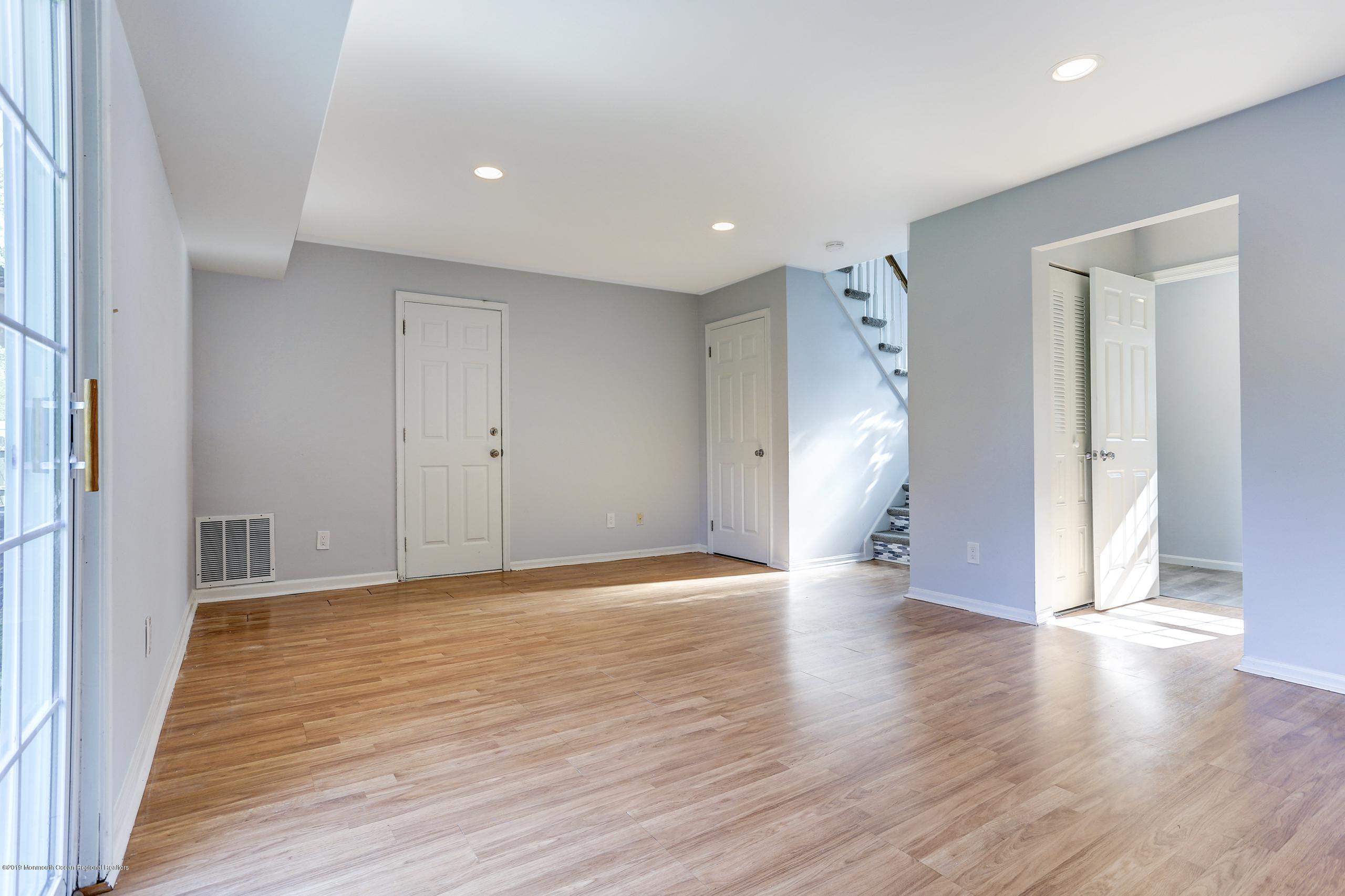32 Hedgewood Road Howell, NJ 07731 - Photo 25 of 30 a view of empty room with wooden floor
