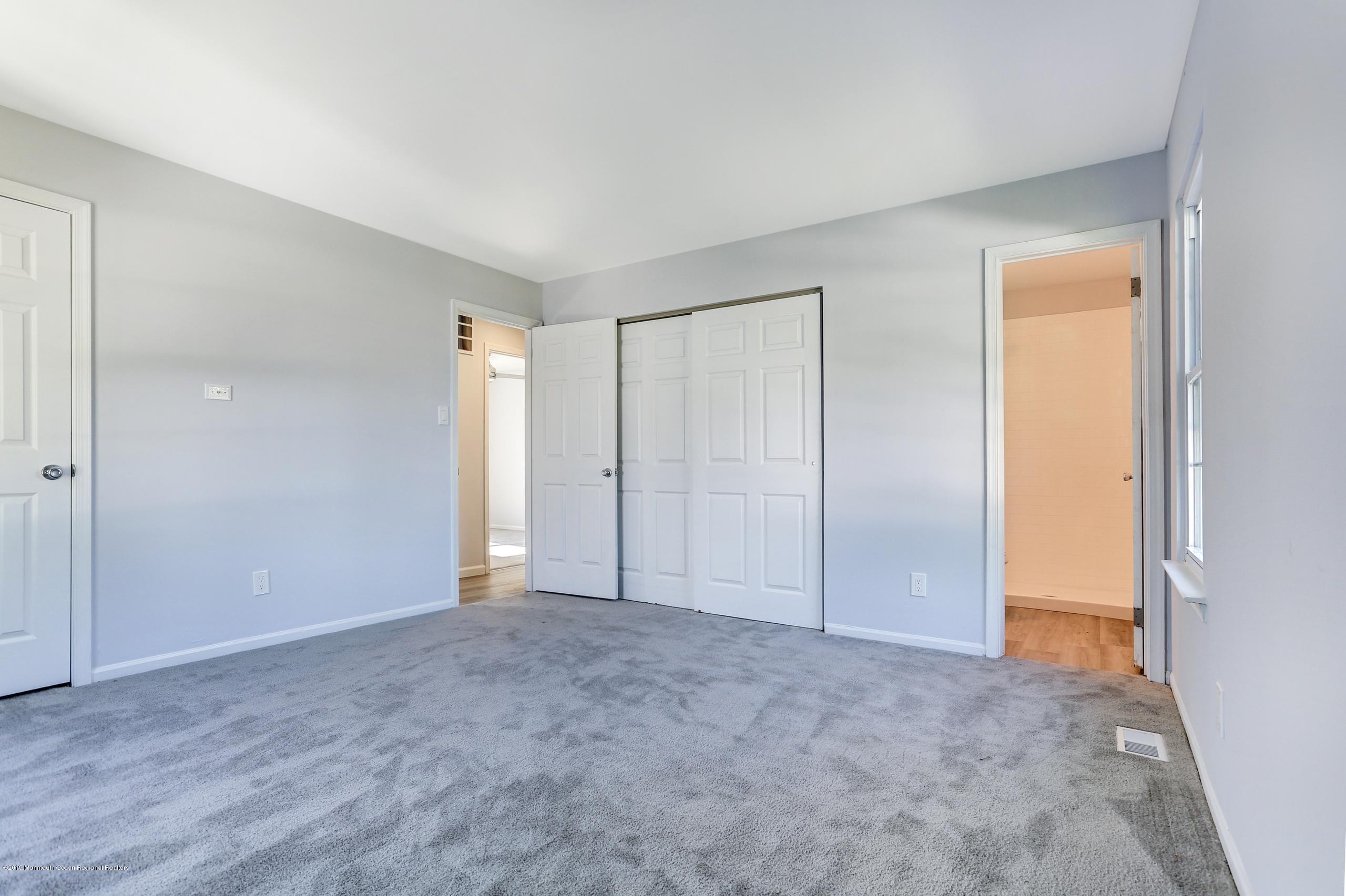 32 Hedgewood Road Howell, NJ 07731 - Photo 26 of 30 a view of an empty room and closet area