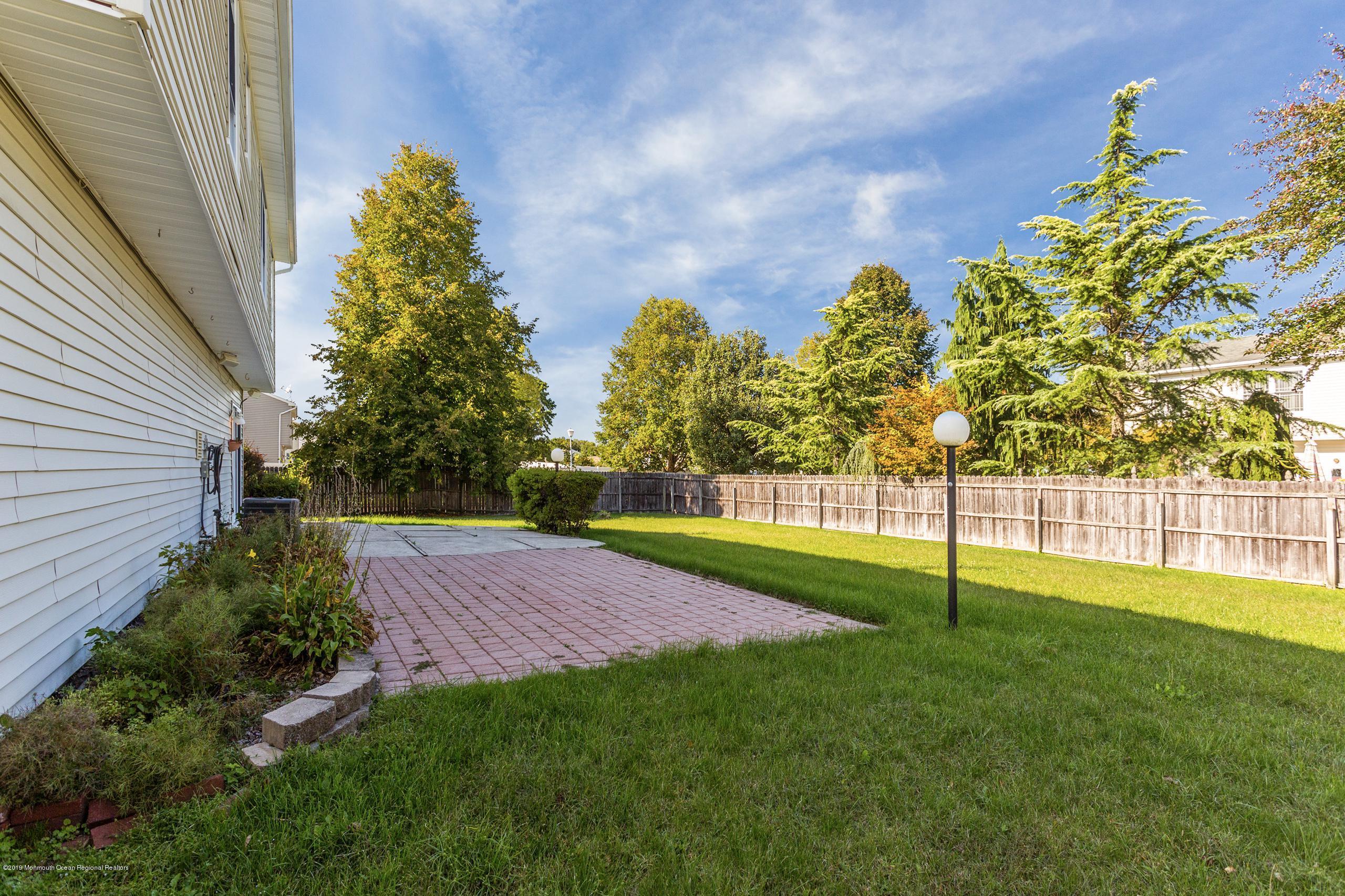 32 Hedgewood Road Howell, NJ 07731 - Photo 28 of 30 a view of yard with green space