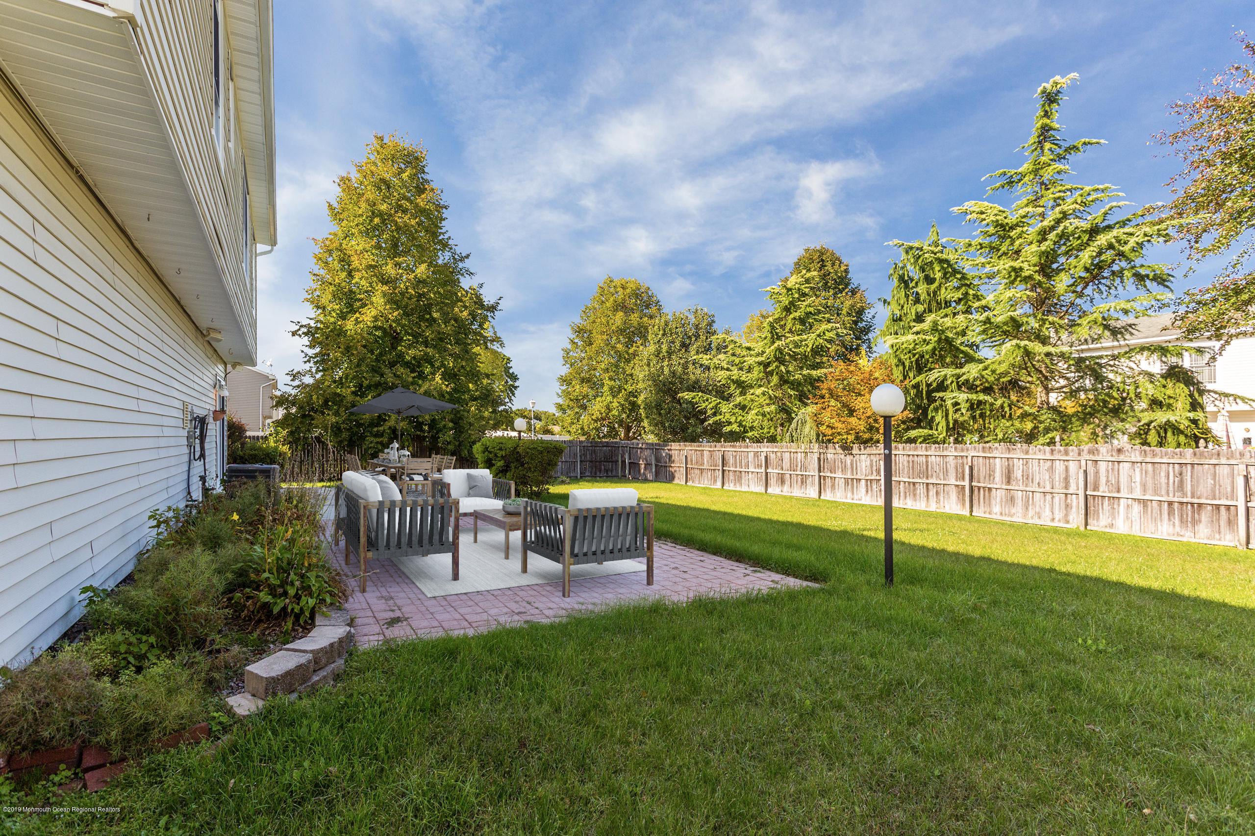 32 Hedgewood Road Howell, NJ 07731 - Photo 29 of 30 a view of house with backyard and sitting area