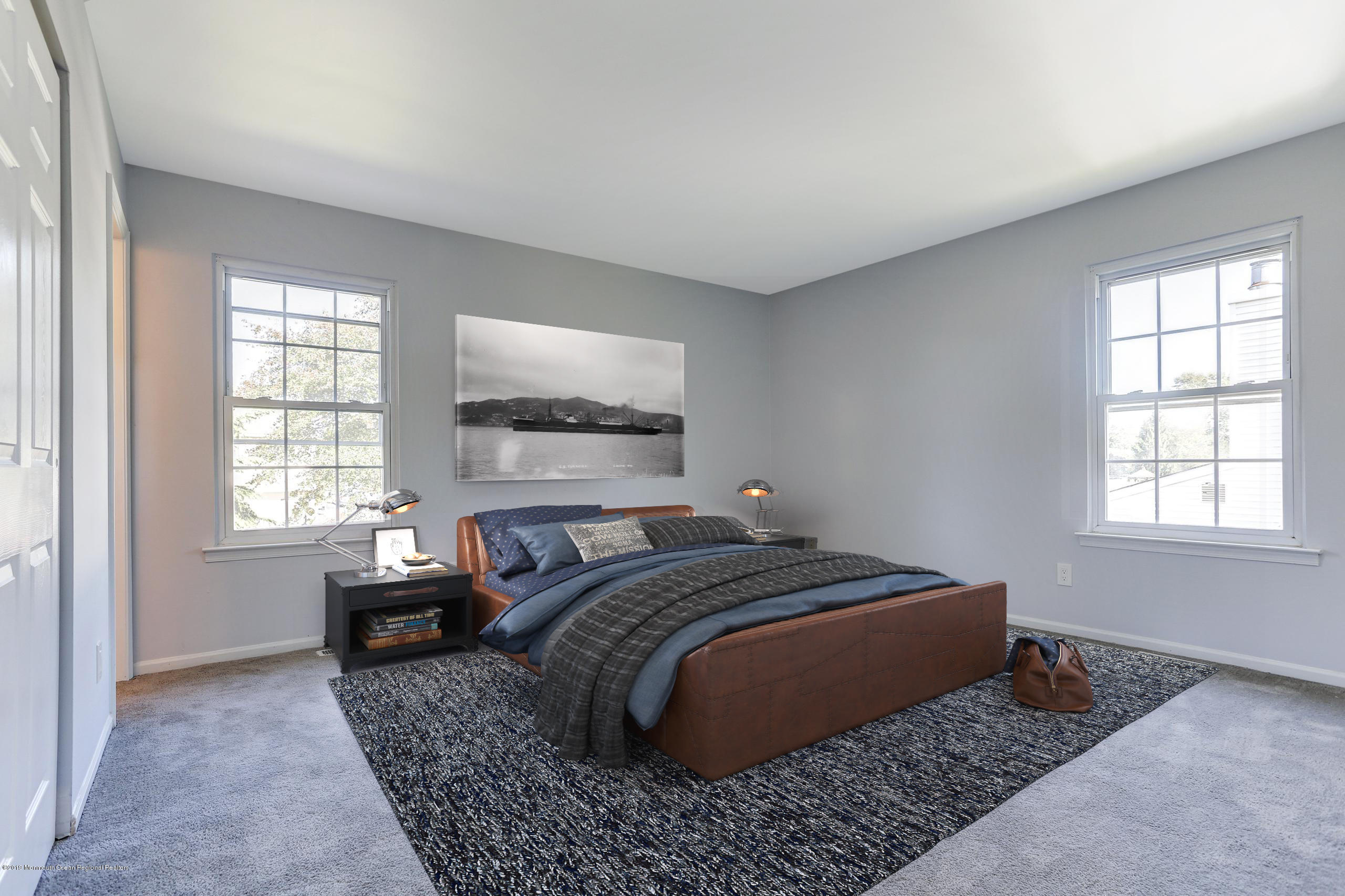 32 Hedgewood Road Howell, NJ 07731 - Photo 8 of 30 a bed sitting in a bedroom next to a window