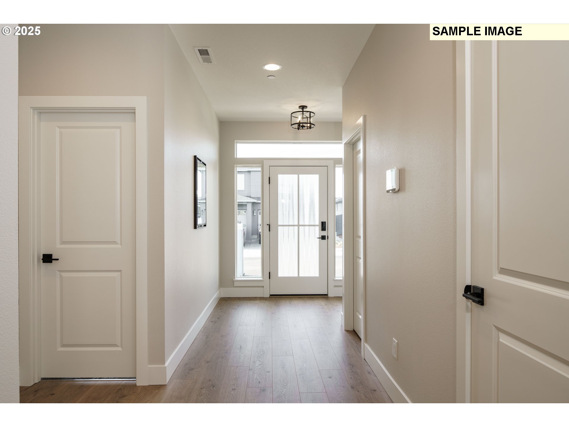 3701 North 12th Circle Ridgefield, WA 98642 - Photo 4 of 6 a open hall with wooden floor
