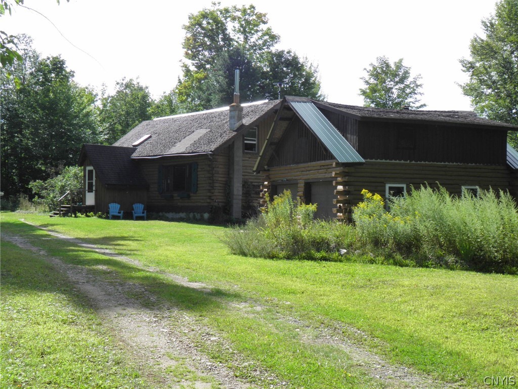 224 Harriman Road Hopkinton, NY 12980 - Photo 1 of 1 Cabin, Garage & Driveway