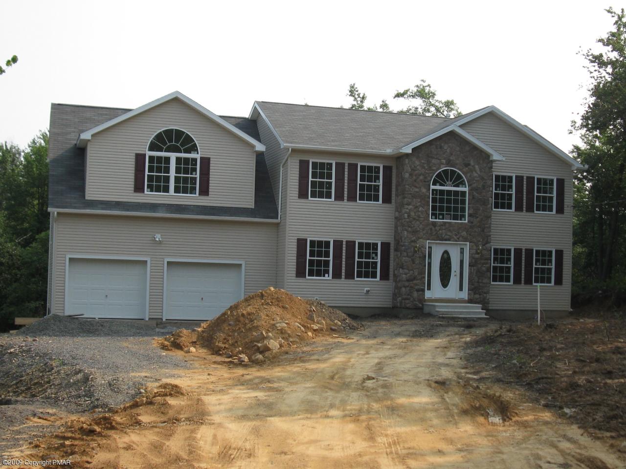 5887 Clover Road Long Pond, PA 18334 - Photo 1 of 1 a view of a house with a yard