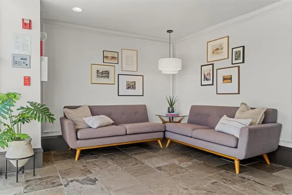 a living room with furniture and a couch