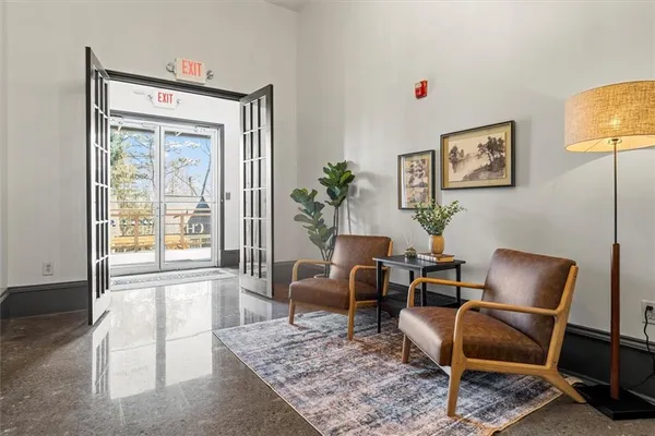 a living room with furniture and a window