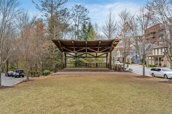 a view of a street with houses on both side