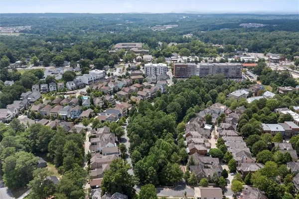 an aerial view of a city with lots of residential buildings