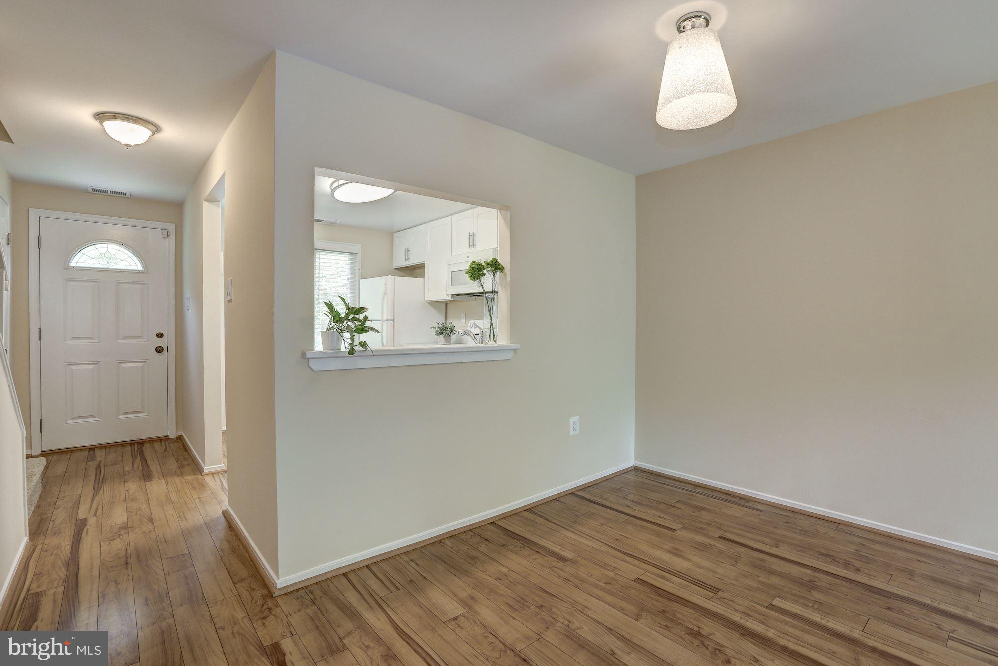 10716 Lester Street Silver Spring, MD 20902 - Photo 12 of 25 Love the pass thru window from kitchen to dining