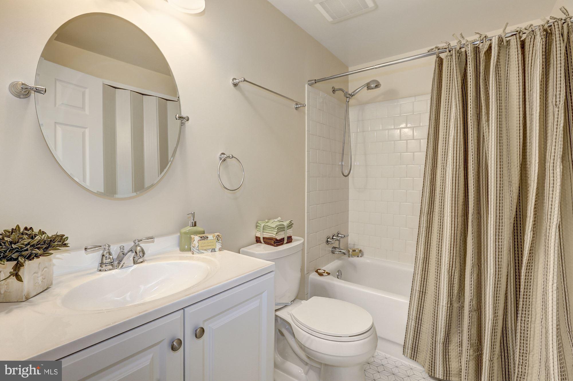 10716 Lester Street Silver Spring, MD 20902 - Photo 21 of 25 Updated BR including new vanity & flooring.