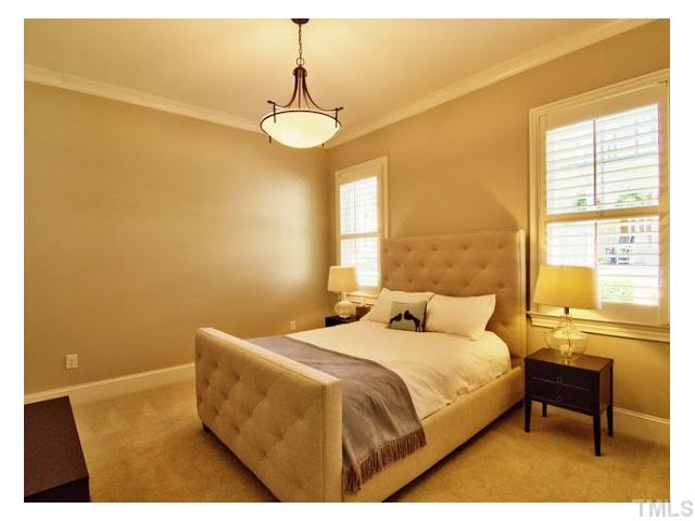 7916 Longleaf Branch Court Raleigh, NC 27612 - Photo 14 of 25 1st Floor Guest Suite has double closet and a full bathroom adjacent to room. "Mom, can you come vist?"