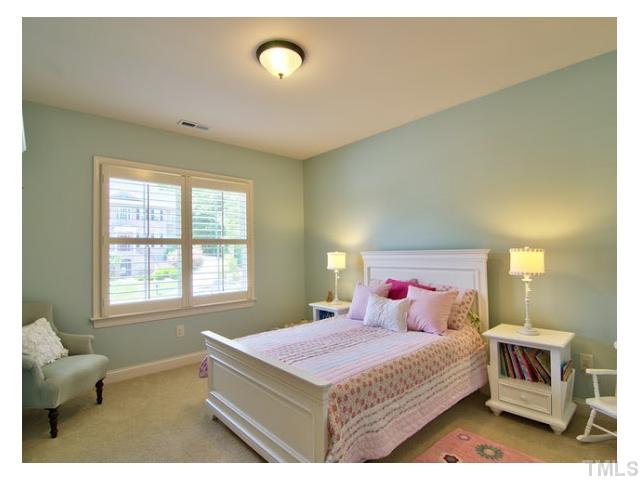 7916 Longleaf Branch Court Raleigh, NC 27612 - Photo 20 of 25 Secondary bedroom example (there are 4 in total - 3 on 2nd floor, 1 on 1st floor), all generously dimensioned, plenty of closet space, abundant natural light. 1 secondary bedroom on the 2nd floor also has an en-suite bath, 2 BR's share a Jack & Jill bath.