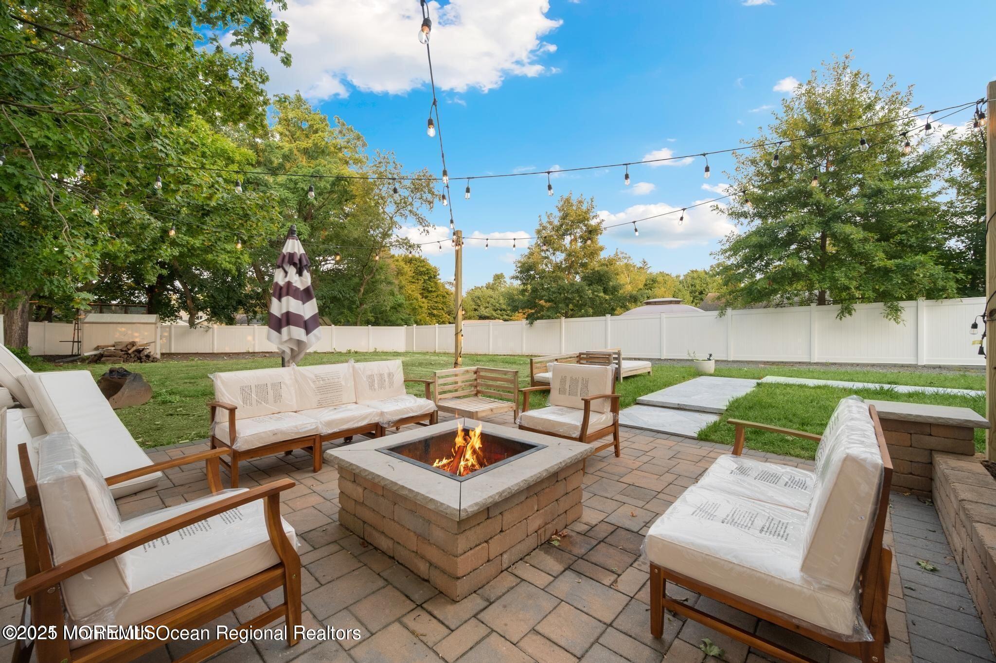 300 Monmouth Road West Long Branch, NJ 07764 - Photo 3 of 10 a view of a patio with couches chairs and a table