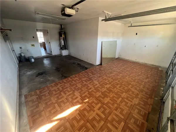 a view of a house with wooden deck