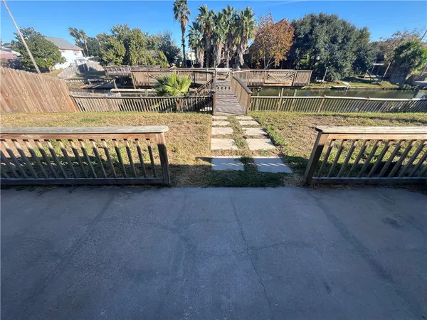 a view of roof deck with patio