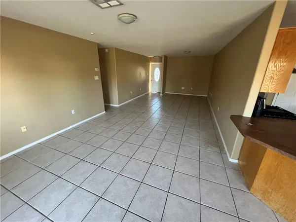 a view of a livingroom with an empty space and a sink