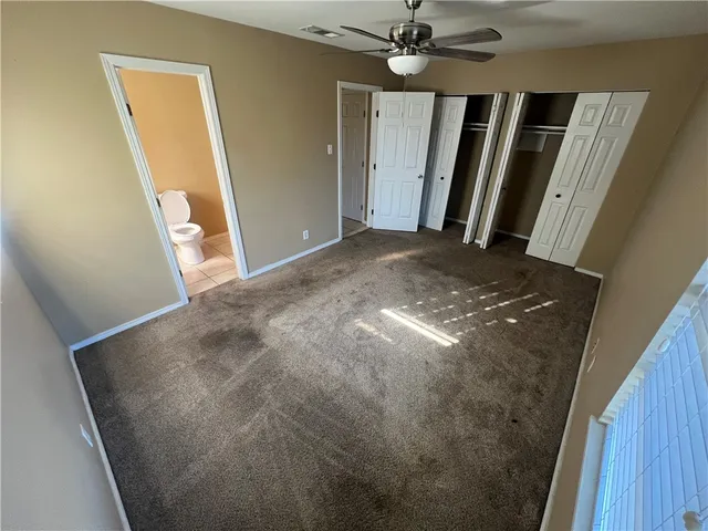 a bathroom with a sink a toilet and tub