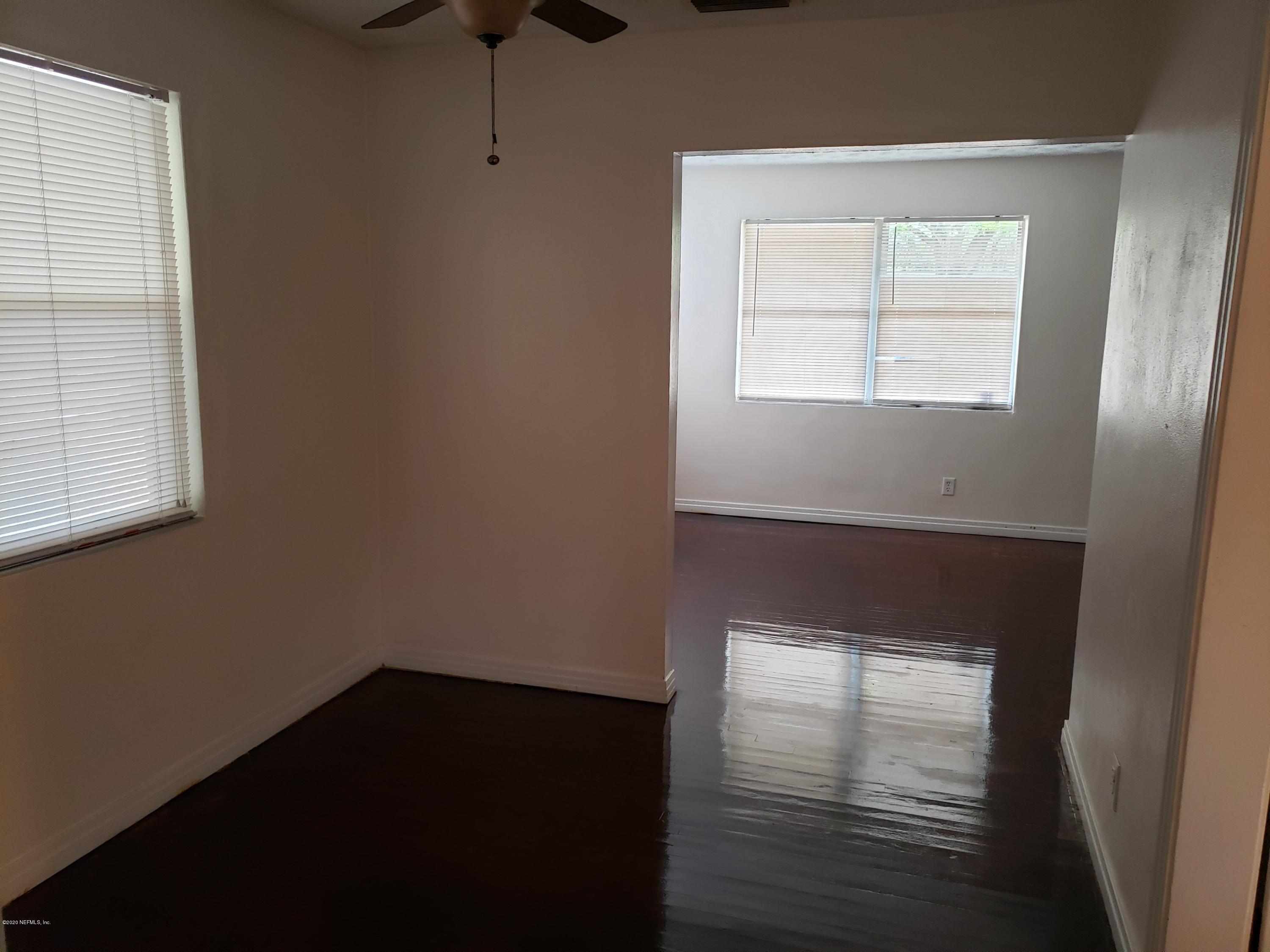 2334 Rogero Road Jacksonville, FL 32211 - Photo 4 of 17 dining room to living room