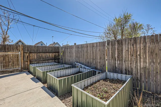 a view of outdoor space with swimming pool and furniture