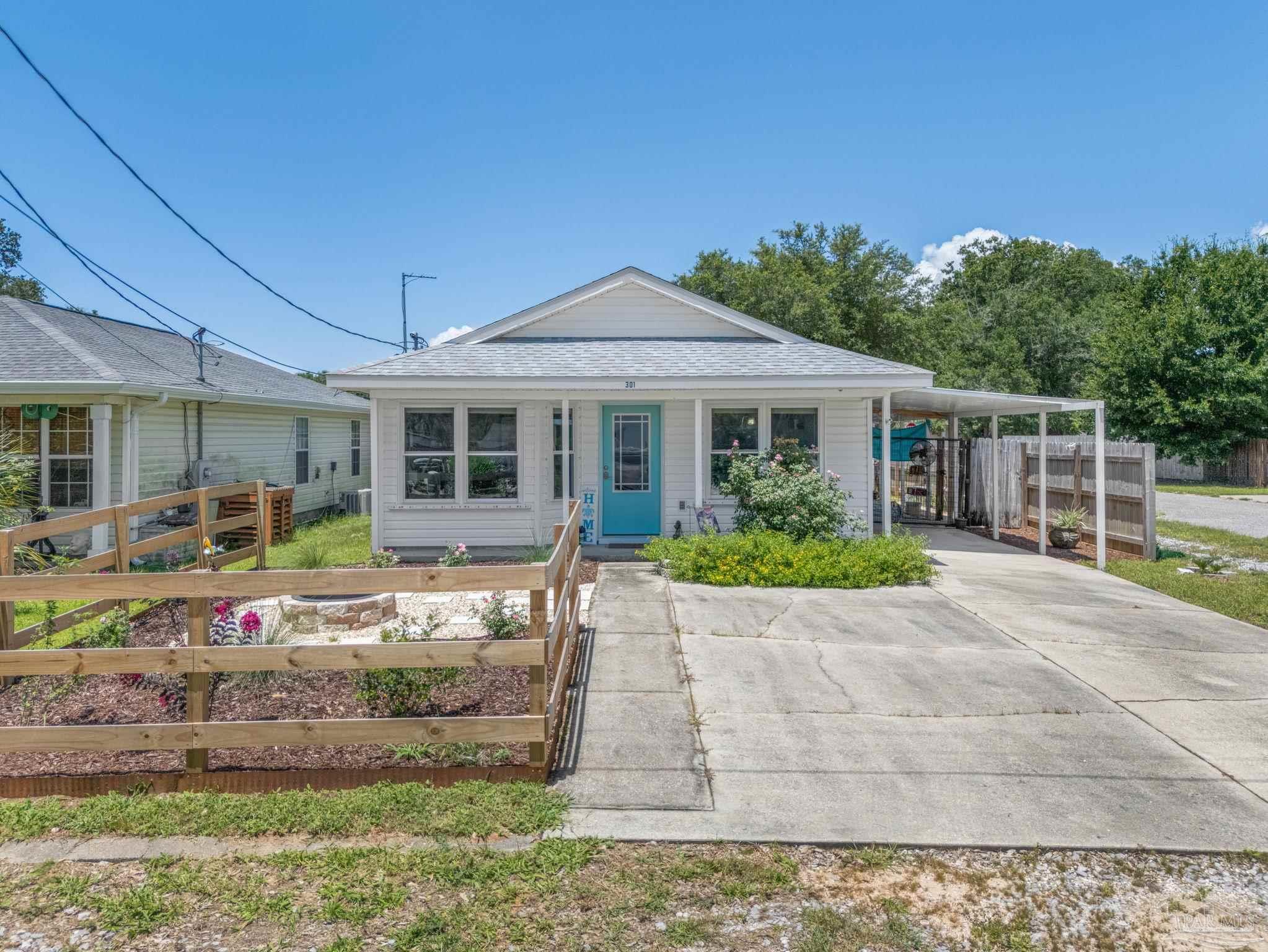 5301 Viking Road Pensacola, FL 32507 - Photo 5 of 35 a view of a yard in front of house