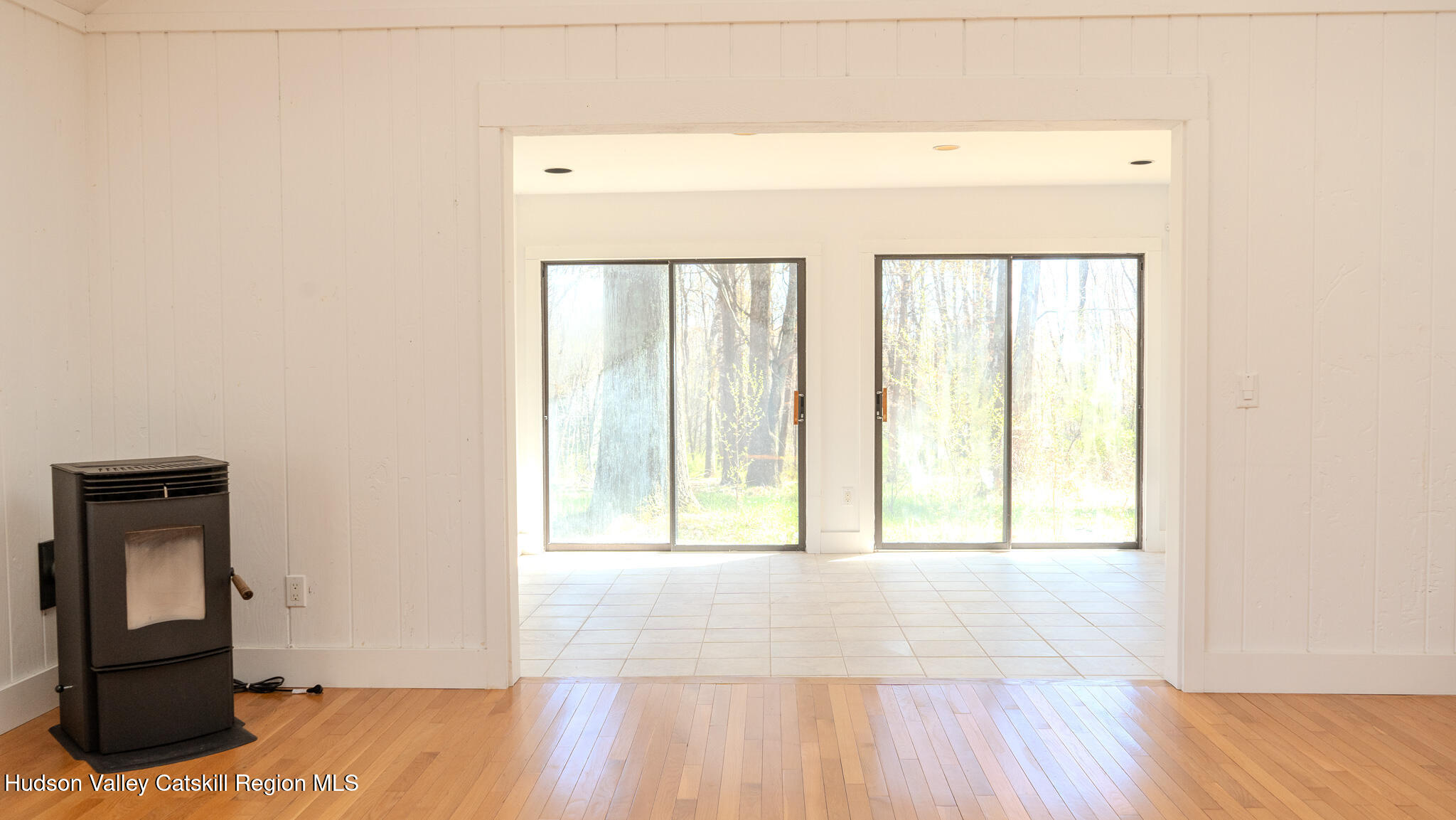 41 Pond Hill Road Copake, NY 12521 - Photo 4 of 25 a view of a room with wooden floor and a window
