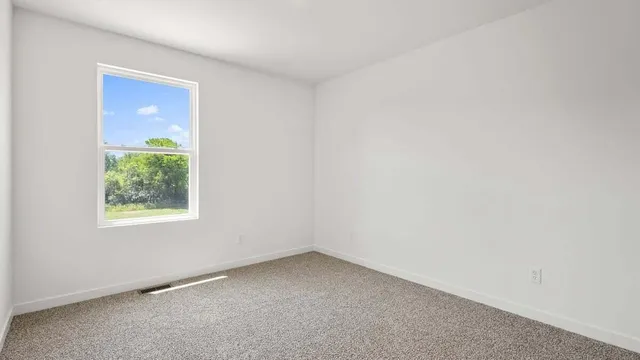 an empty room with closet