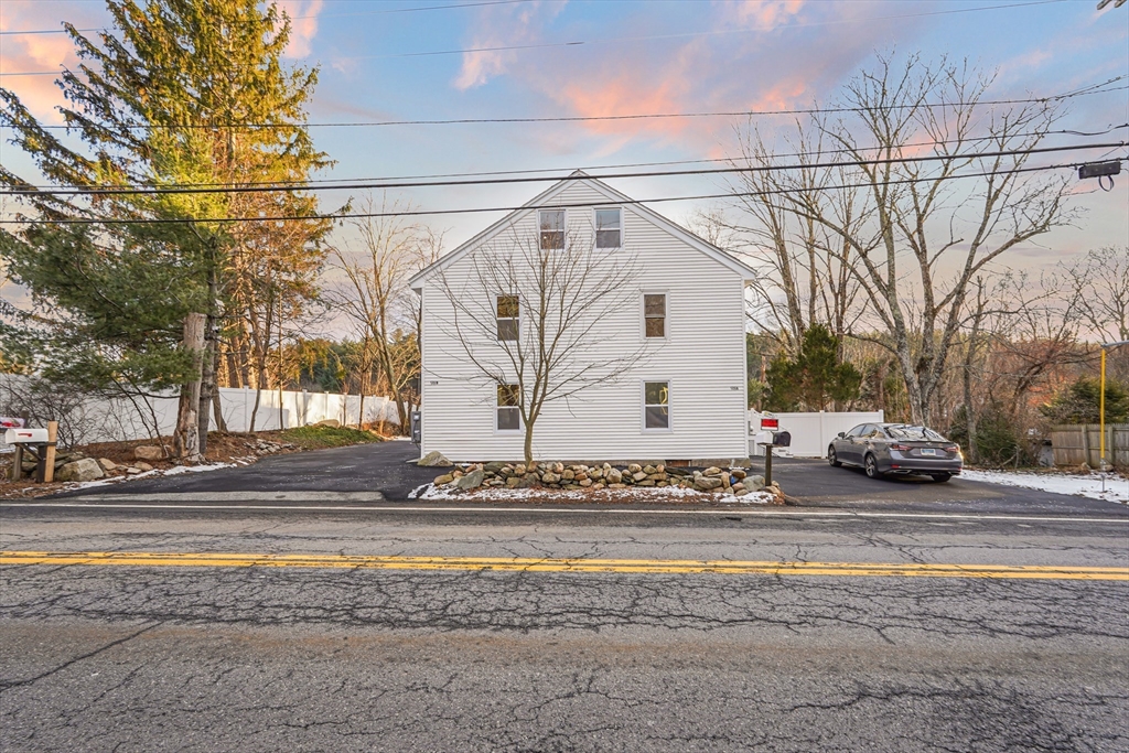 98 Southville Road, Unit B Southborough, MA 01772 - Photo 27 of 32 a view of street with a white house
