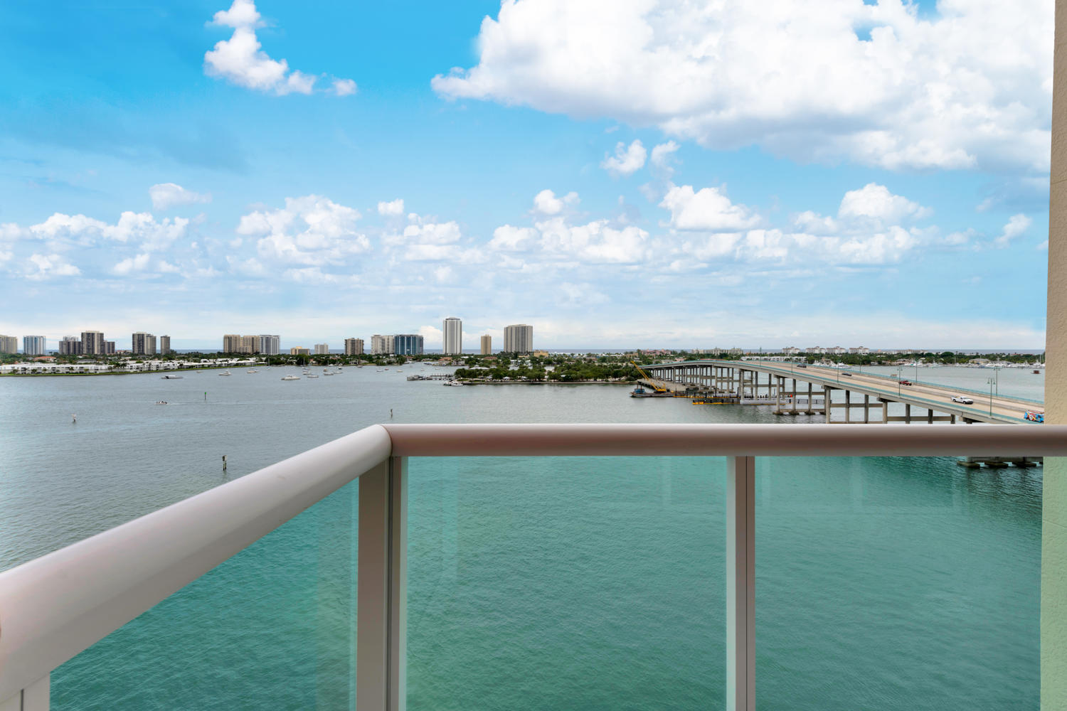2640 Lake Shore Drive, Unit 1011 Riviera Beach, FL 33404 - Photo 23 of 60 a view of a lake from a balcony