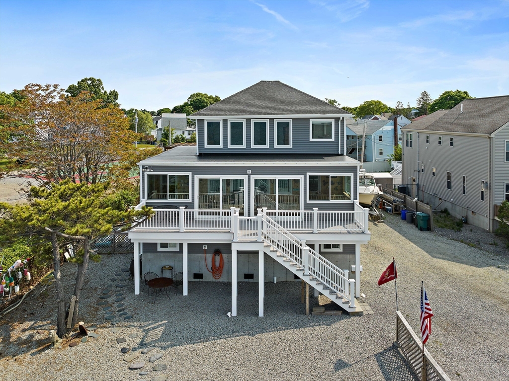 a aerial view of a house with a porch