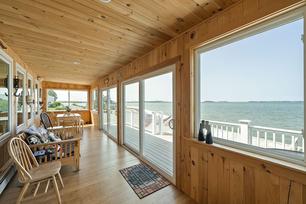 91 Shellton Road Quincy, MA 02169 - Photo 11 of 31 a view of a chairs and table on the balcony