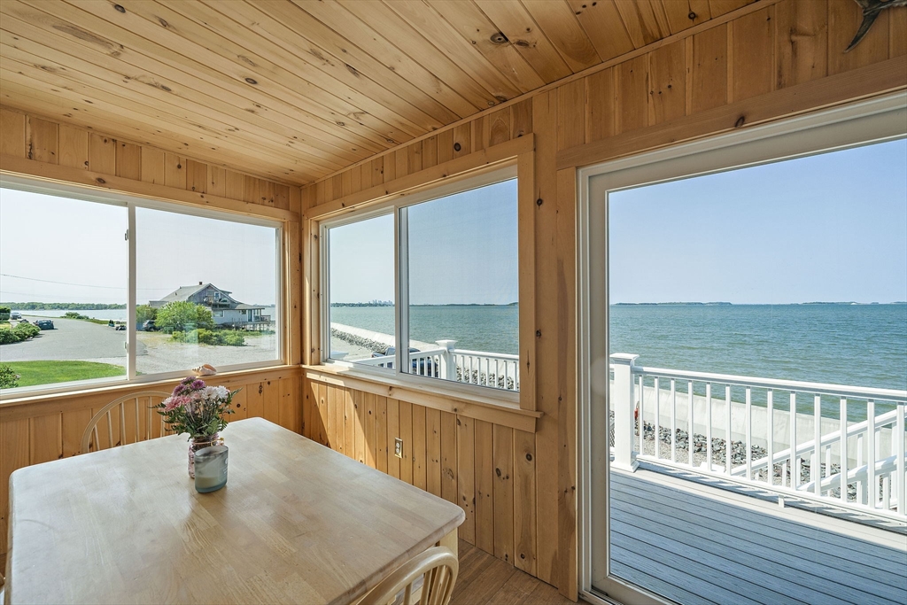 91 Shellton Road Quincy, MA 02169 - Photo 12 of 31 a dining room with furniture window and outside view