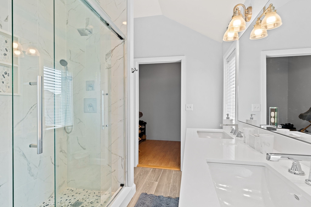 91 Shellton Road Quincy, MA 02169 - Photo 20 of 31 a bathroom with a sink and a mirror