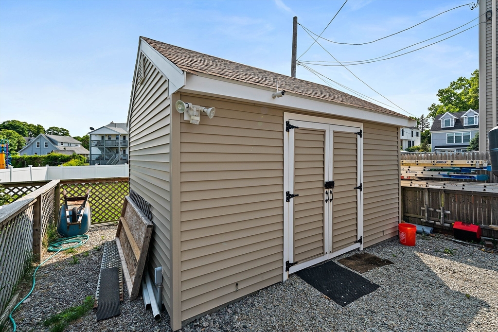 91 Shellton Road Quincy, MA 02169 - Photo 26 of 31 a view of a house with a patio