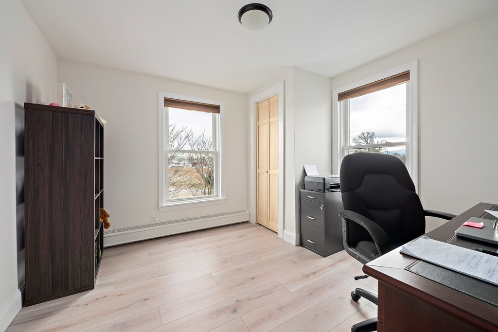 91 Shellton Road Quincy, MA 02169 - Photo 8 of 31 a living room with furniture and a window