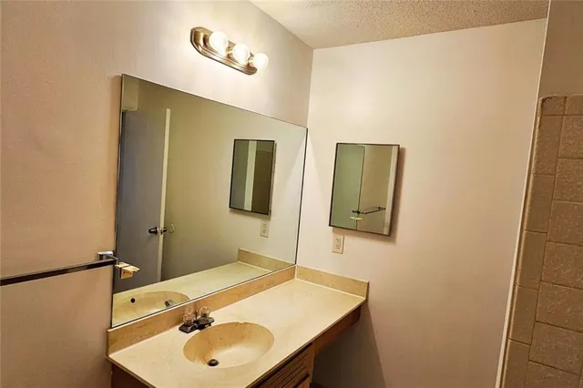 a bathroom with a toilet and a bathtub