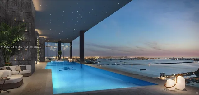 a view of swimming pool from a balcony