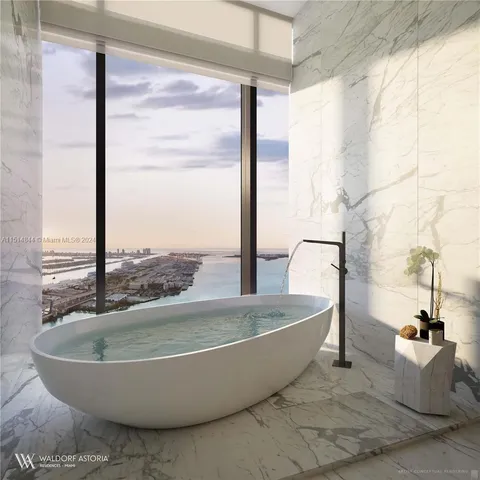 a view of a bathtub in a bathroom