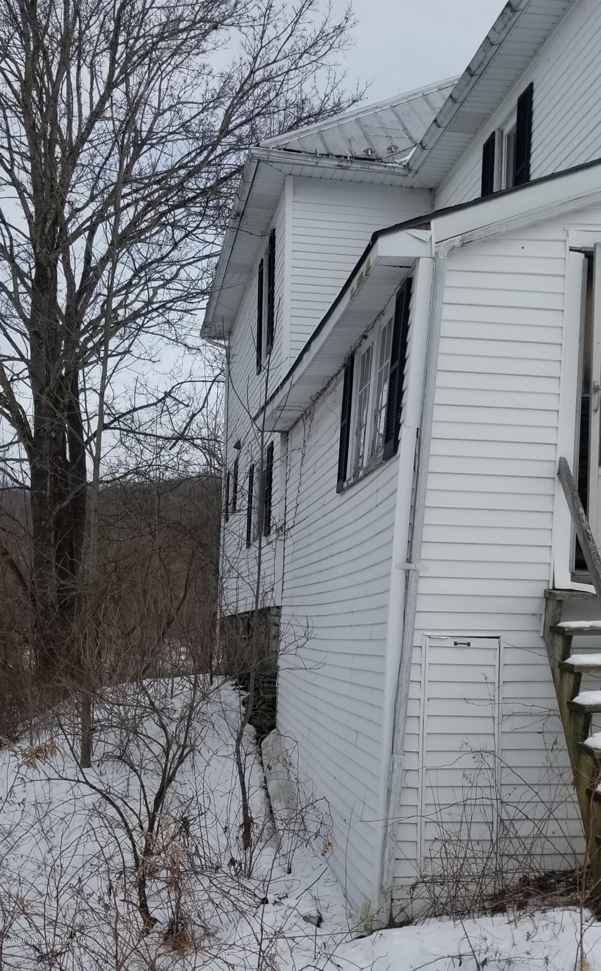 1443 Marcy Road Springville, PA 18844 - Photo 3 of 13 a view of a house with a yard