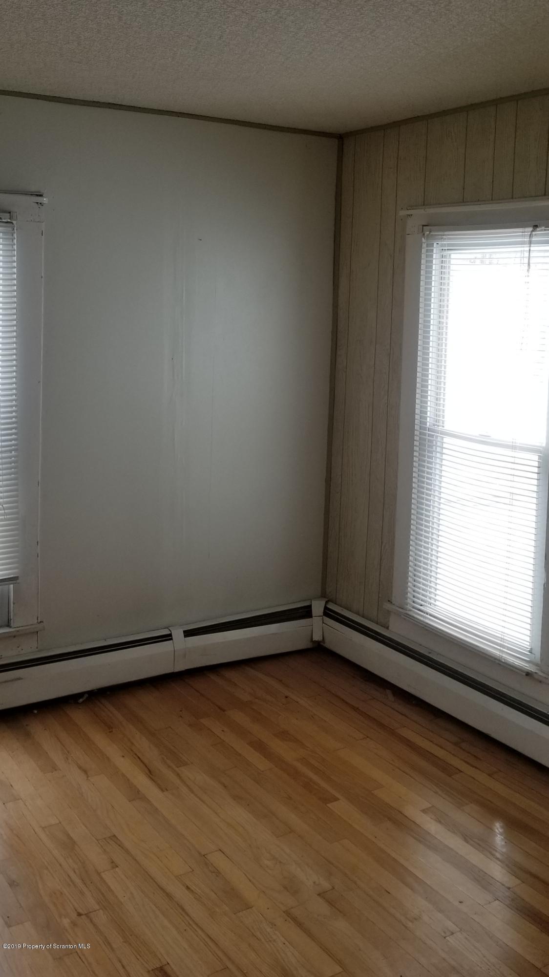 1443 Marcy Road Springville, PA 18844 - Photo 8 of 13 a view of an empty room with a window