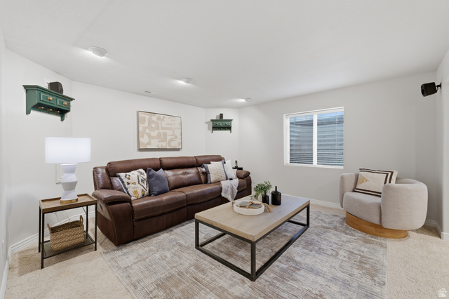 1888 East Cobblestone Road Springville, UT 84663 - Photo 34 of 44 Spacious living area featuring light-colored walls, recessed ceiling lighting, and a window with horizontal blinds