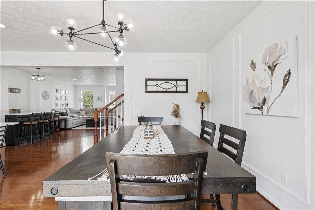 19 Truman Circle McKees Rocks, PA 15136 - Photo 7 of 45 a view of a dining room with furniture and wooden floor
